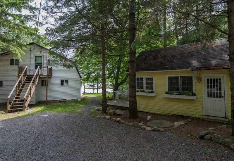 Guest cottage in Muskoka and 3 unit apartment building.